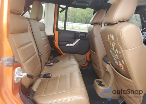 2011 Jeep Wrangler Unlimited Sahara from USA, damaged, VIN 1J4BA5H14BL619275